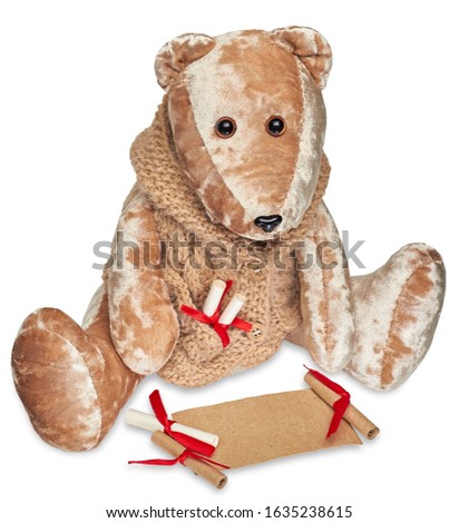 Teddy bear with love notes. In a knitted sweater. The concept of reconciliation. I'm sorry