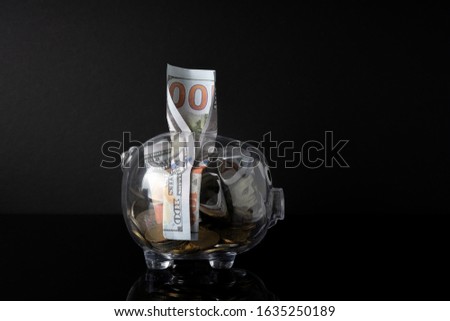 Piggy bank and black background with saving concept.