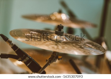 Closeup of cymbal for drums in studio Royalty-Free Stock Photo #1635307093