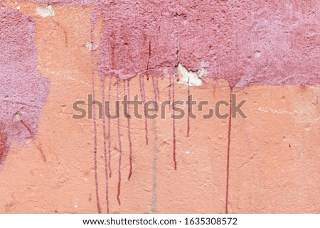 Paint on an old wall as an abstract background. Texture