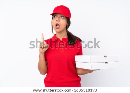 Young Pizza delivery girl over isolated white background thinking an idea pointing the finger up