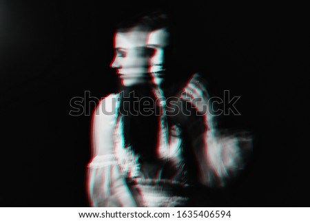 abstract portrait of a girl with mental disorders and schizophrenic diseases with blur. Black and white photo with glitch effect out of focus Royalty-Free Stock Photo #1635406594