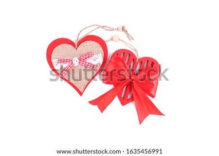 Red decorative hearts on a white background, isolated, valentine's day