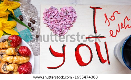 strawberry, cookie hearts with a Cup of black coffee beans, with yellow flowers and a note I LOVE you happy Valentine's day mother woman Easter day with love along with a place for text