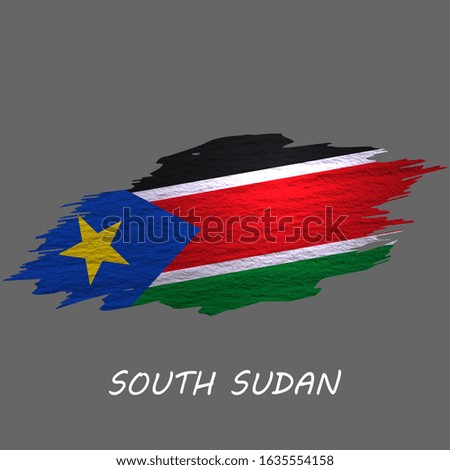 Grunge styled flag of South Sudan. Brush stroke background