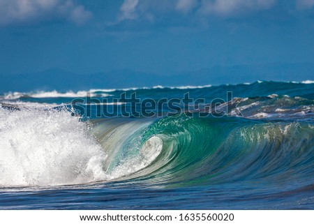 Ocean Wave Closeup Water. Ocean wave closeup detail of upright crashing hollow breaking water. energy power of nature.