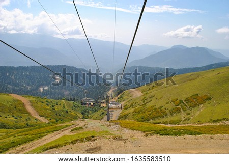 mountain landscape on the background of the cableway and mountains