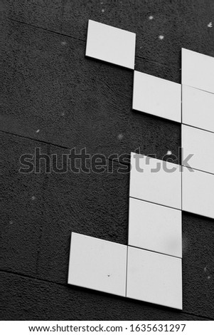 White Square Pixel Design On Black Wall Texture