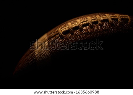 a football with dark background
