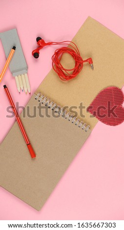 craft album with pencils and colorful hearts