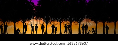 Many people are seen under trees in a park at the end of a day. The figures are silhouettes that contrast with the colorful golden sunset sky behind them.