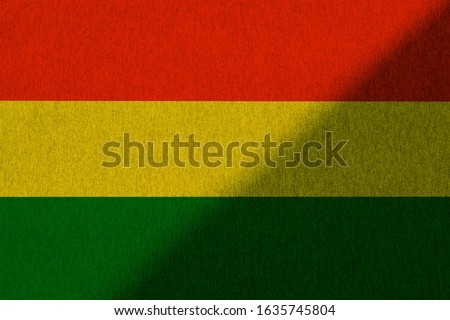 Green yellow red reggae background on canvas texture 