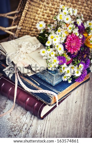 Vintage Albums with Photos of Memories,bouquet of  flowers,letters and key/ nostalgic vintage background