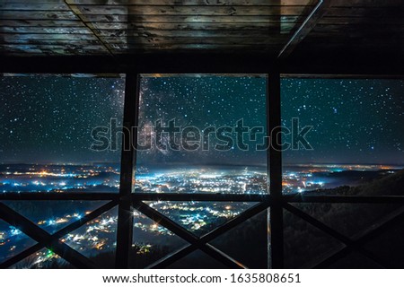 Starry sky over the night Ukrainian city