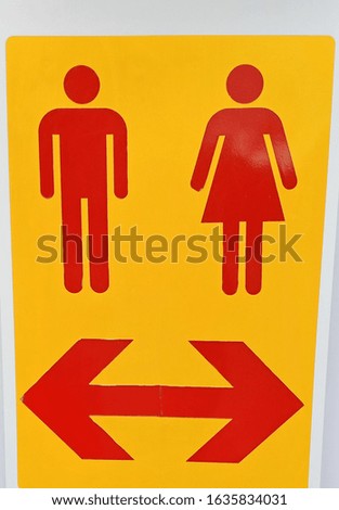 Signs for women and men 's toilets