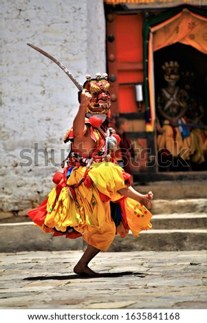 Bhutan dance(tibet dance),Close up Traditional dance and colors in Mongar, Bhutan ,masked dancers at a Buddhist religious ceremony,happy holiday
