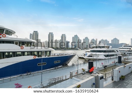 Modern urban architecture and marina on yachts in Shanghai, China
