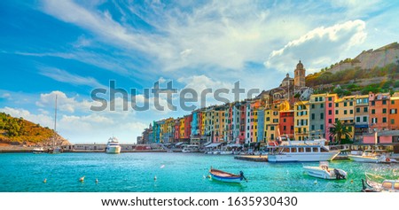 Portovenere colorful village on the sea. Boats, church and houses. Five lands, Cinque Terre, Liguria Italy Europe.