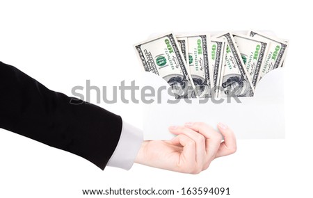 Businessman Hand and money in envelope isolated on white background