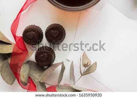 coffee and candies with hearts. card mockup. invitation. leaves. 