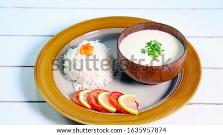 Middle Eastern Tahini Salad with white rice in plate stock Photo. Tahini, salad, white rice, Arabic Food