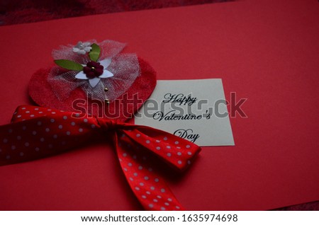 Happy Valentine's Day card with sign and peper hearts close up
