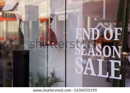 End of the season sale sign on the window shop of fashion clothing boutigue