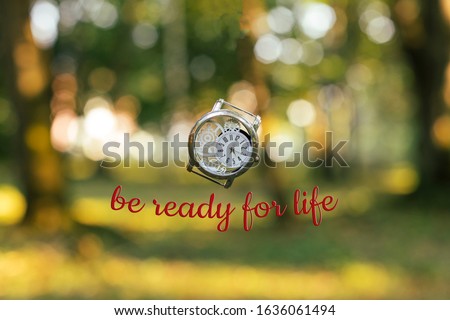 motivator concept wallpaper picture "Be ready for life" text text vintage hand clock symbolizing new beginning and start on blurred unfocused nature bokeh background 