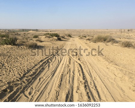 muddy road in the desert