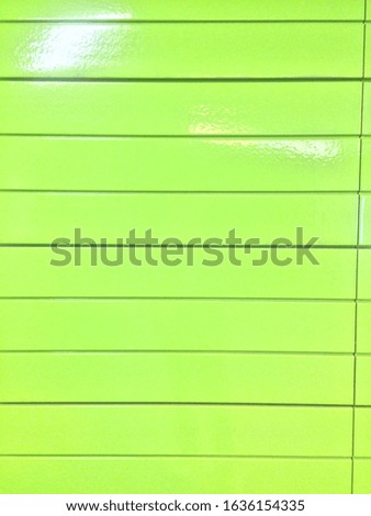 light green pattern with vertical lines 