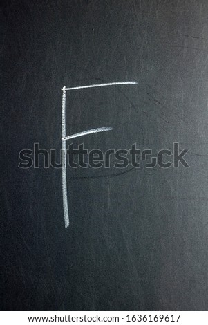 Letter F on a chalk board