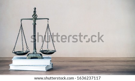 Lawyers office concept on rustic wooden table.