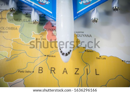 Brazil Toy Air plane on the Map of Brazil Brazilian Map with an Air plane miniature photo top shot