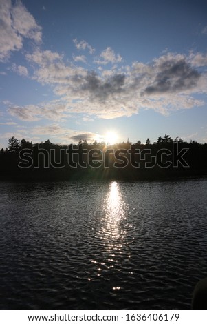 Sunset shining on the lake