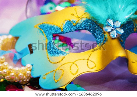 mask, confetti and jewelry, carnival concept