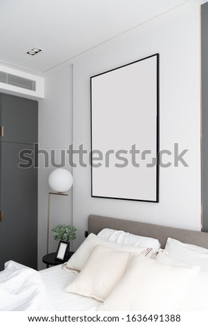 Bedroom corner decorated with huge picture frame in modern luxury style / interior design /copy space/ cozy bedroom