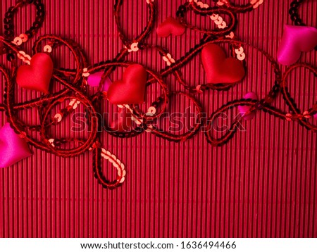 Poster with red and pink hearts, sparkles, glitter, Happy Valentines Day on festive background. Wallpaper for Valentines Day. Love concept