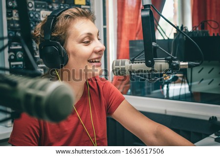 woman radio dj in radio station studio