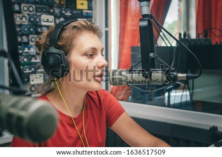 woman radio dj in radio station studio
