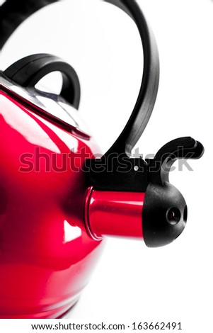 Red  tea kettle isolated on white background
