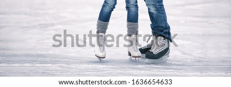 Ice skating outoor rink panoramic banner of people tourists skates learning to skate romantic couple winter activity panorama. Royalty-Free Stock Photo #1636654633