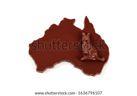 Food photography of Australian themed milk chocolates: a map of Australia and a kangaroo on a white background