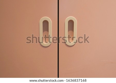 The white door opener of the cabinet