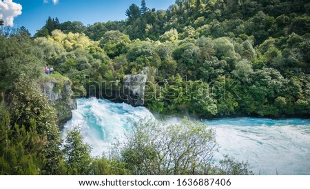 View on falls with turquoise water from lookout. Falls on the picture are Huka Falls located in Taupo region in North Island of New Zealand