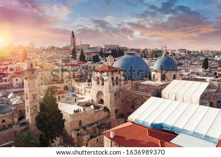 Panoramic aerial view of the Temple of the Holy Sepulcher at sunset in the old city of Jerusalem, Christian quarter, Israel Royalty-Free Stock Photo #1636989370
