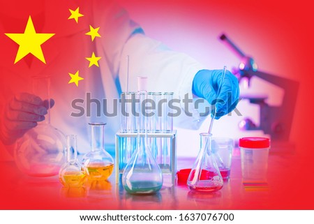 Development of chemistry in China. Chemical industry of China. Chemical research in the laboratory on the background of the flag of the Republic of China. Use of new experimental data in industry.