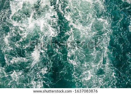 turquoise color sea and ship wave in the sea