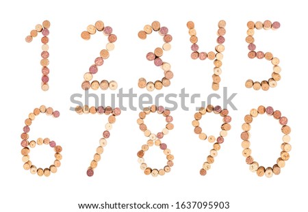 Set of numbers from wine corks isolated on a white background