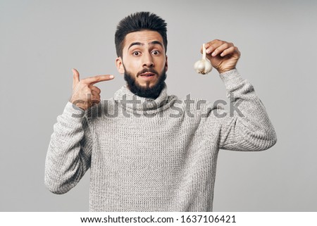 male young guy looking at the camera isolated background