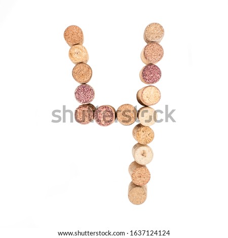 The number 4 is made from wine corks, close-up. Isolated on white background